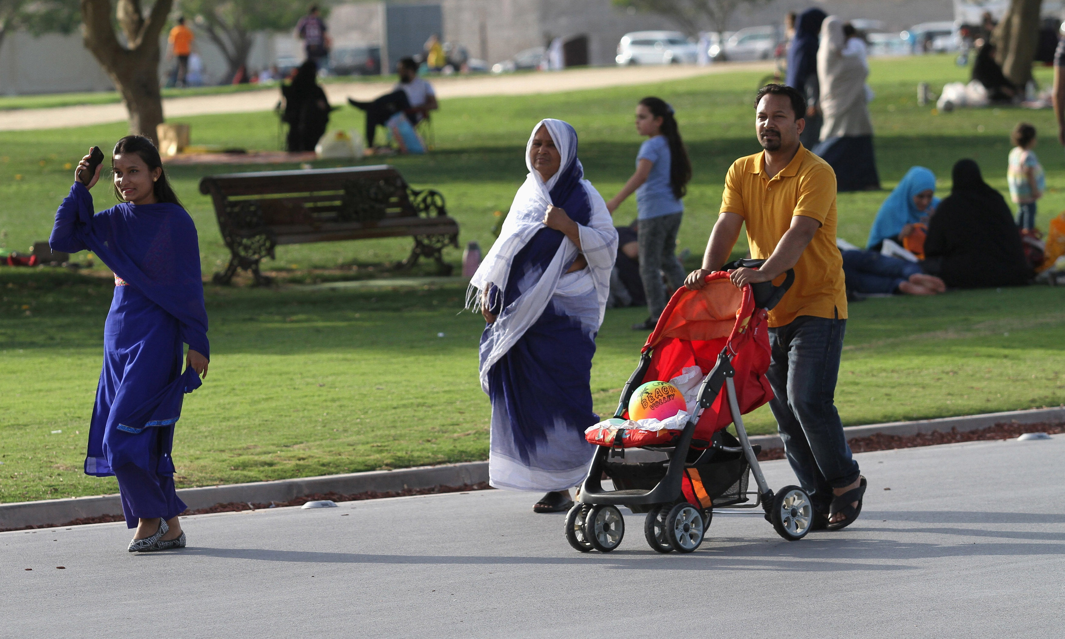 Visitors walk at Aspire Park in Doha, Qatar.  — Reuters