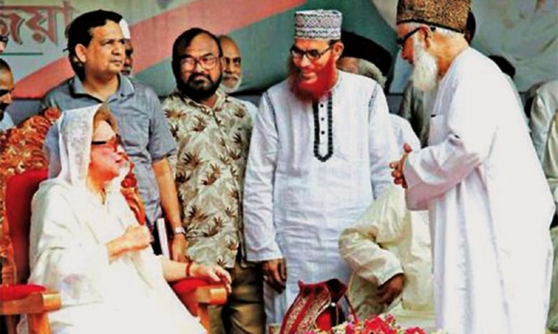 KHALEDA Zia with Jamaat-i-Islami chiefs Motiur Rahman Nizami and Delwar Hossain Sayeedi in 2010. — The Daily Star