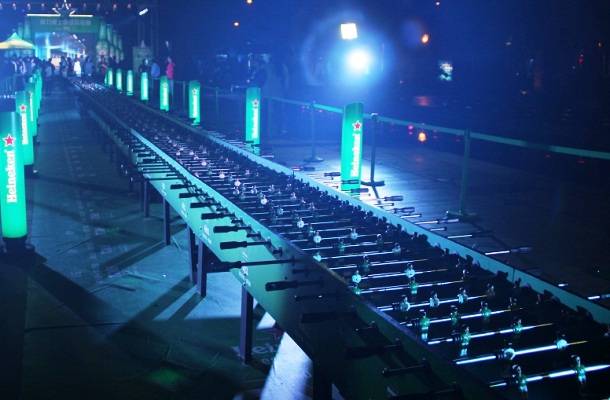 A foosball table, designed to be used by 100 players, is the world