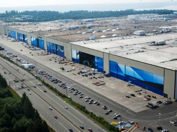 With 100 acres to work with for building 747 planes, the Boeing Factory, in Everett, Washington is the largest by volume in the world.