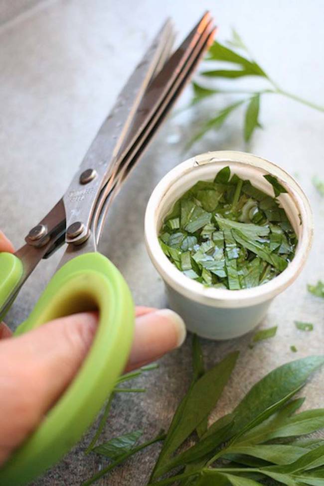 Clean out K-cups, add a little bit of water, and fill them with fresh herbs. Stick them in the freezer and keep them on hand to add to soups and sauces.