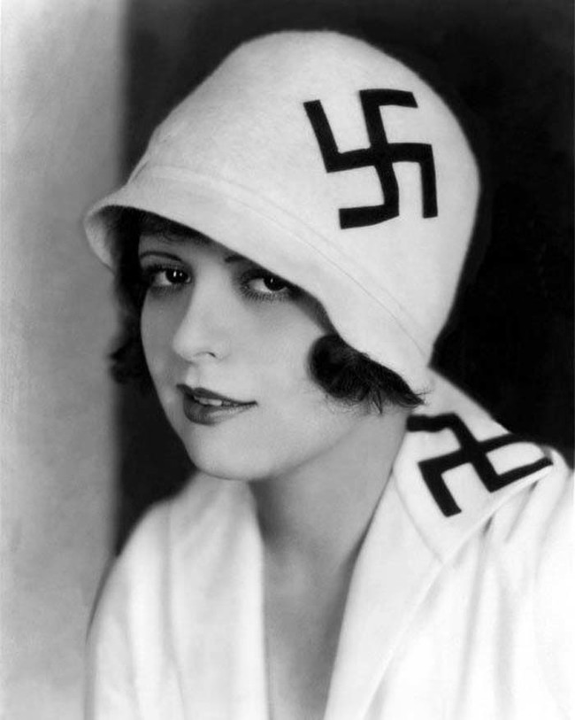 A flapper from the 1920s with some questionable patterns on her outfit.
