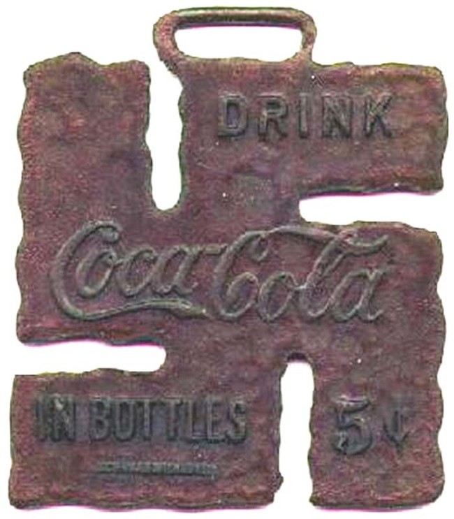 Vintage swastika Coca-Cola pendant from the 1920s.