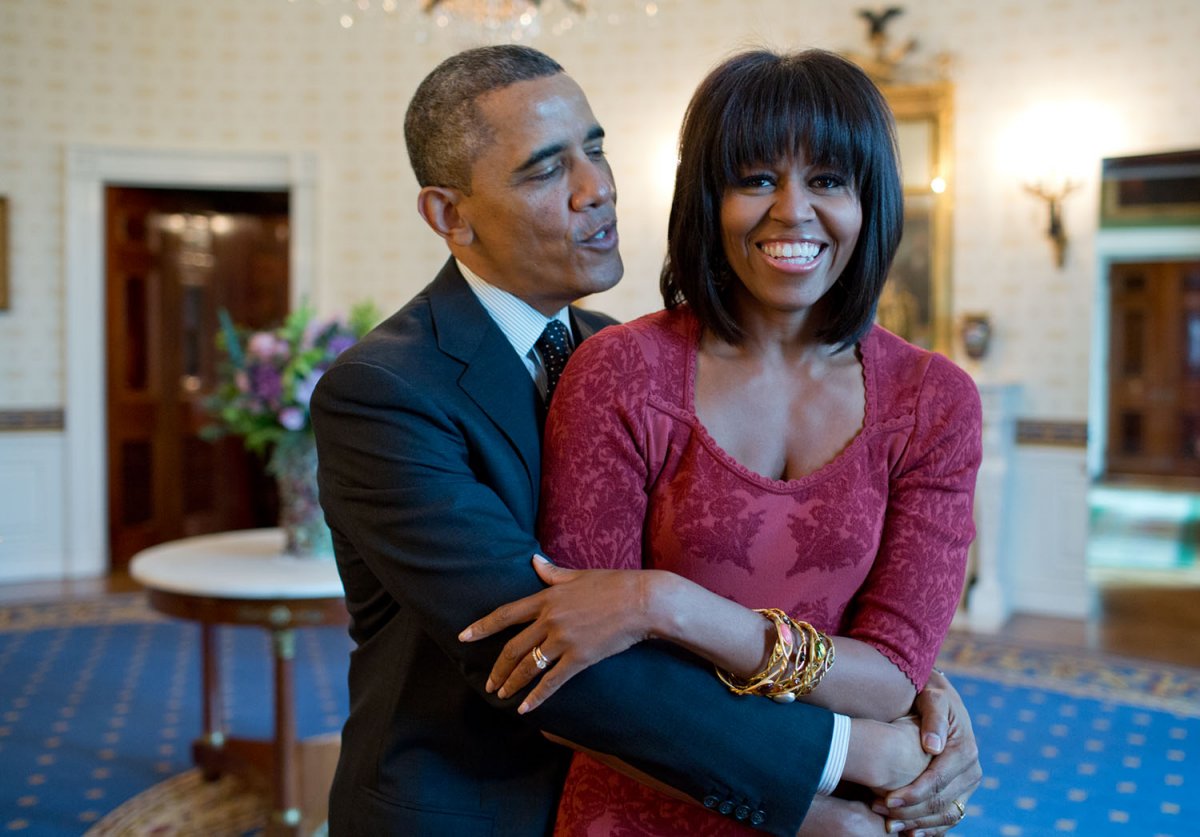 The president sings "Happy Birthday" to Michelle in the Blue Room of the White House. The First Lady